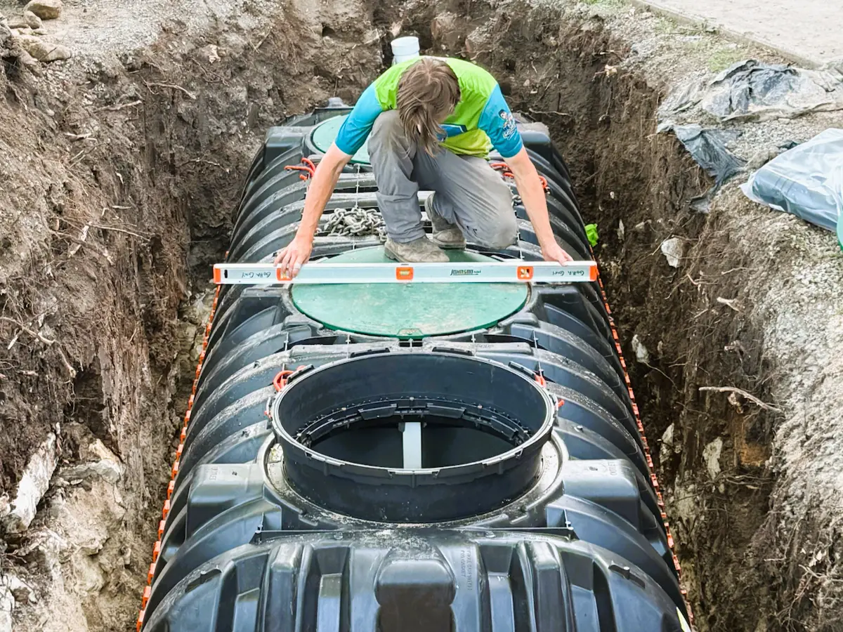 Septic tank access with risers and filter service